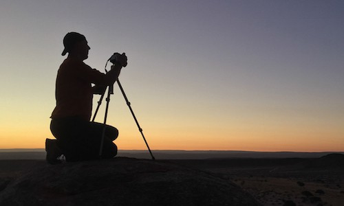 photographer in sunset