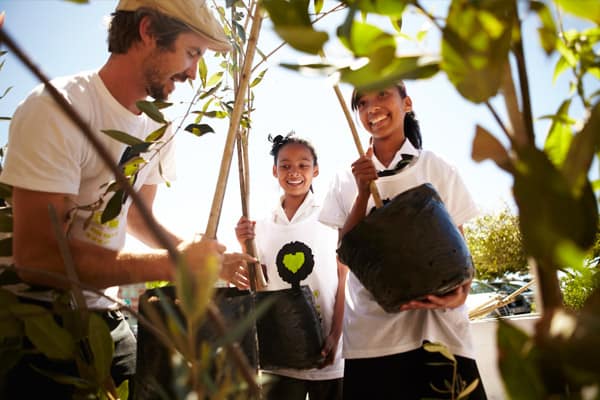 Tourist and local help each other plant