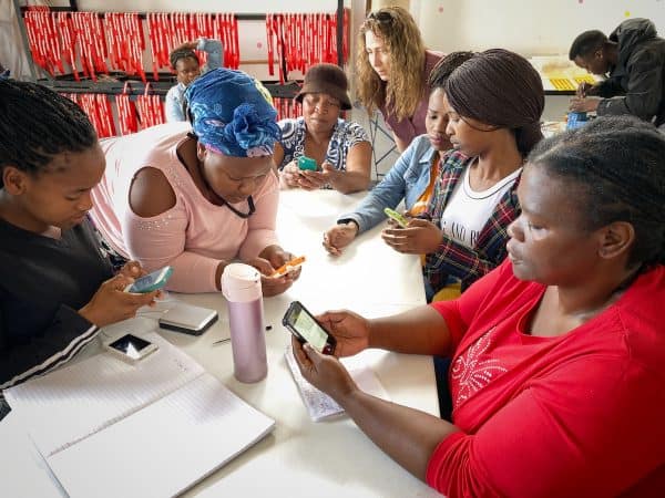 Volunteers using provided phones