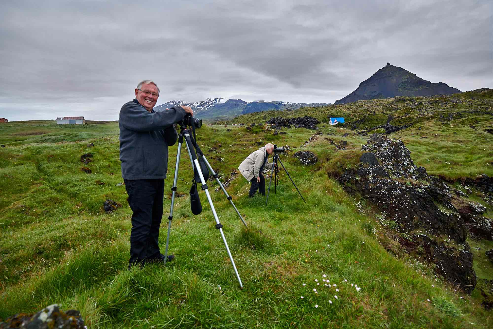 photographers taking photos of mountains in Iceland