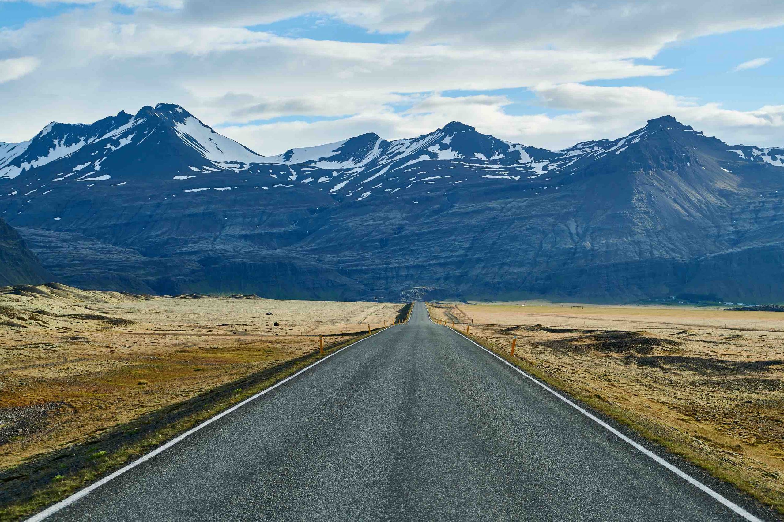 landscape photo of a road and mountains in Iceland