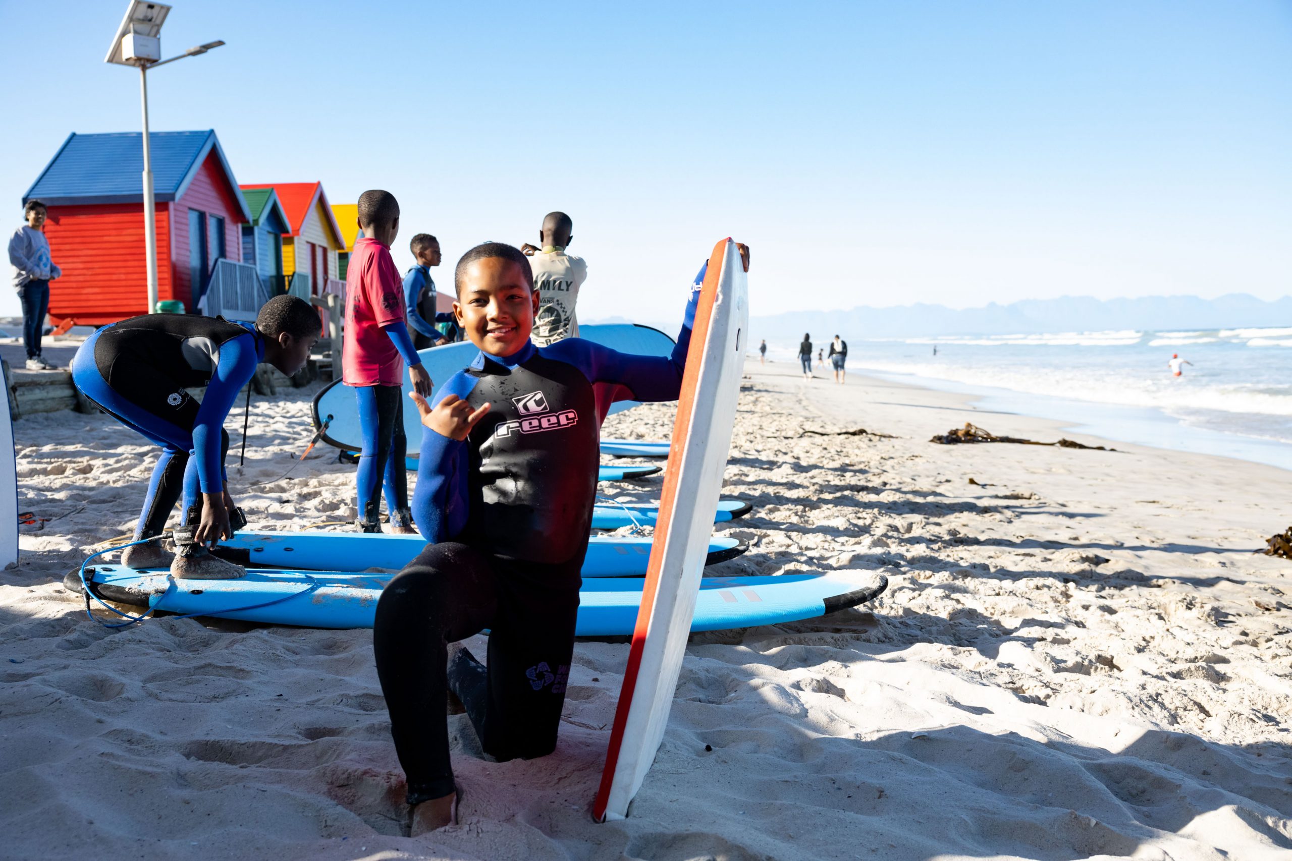local children getting ready to surf