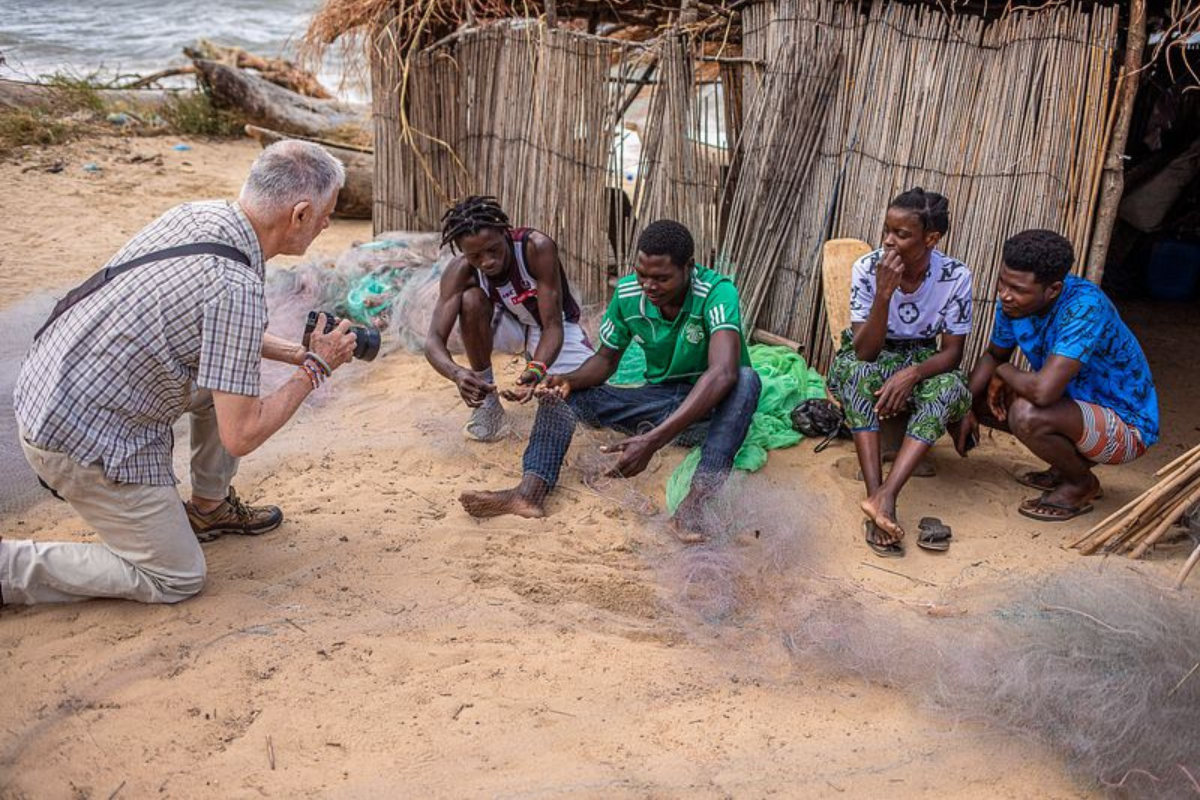 photographer capturing images during a NGO photo program