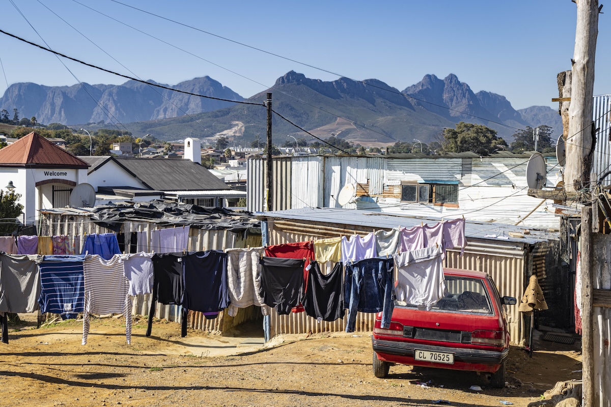 Mountain view with township homes and laundry line